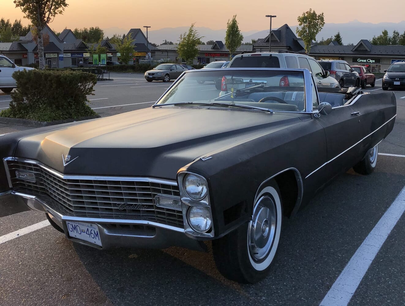 1967 Deville with flat black paint and shiny new white walls.