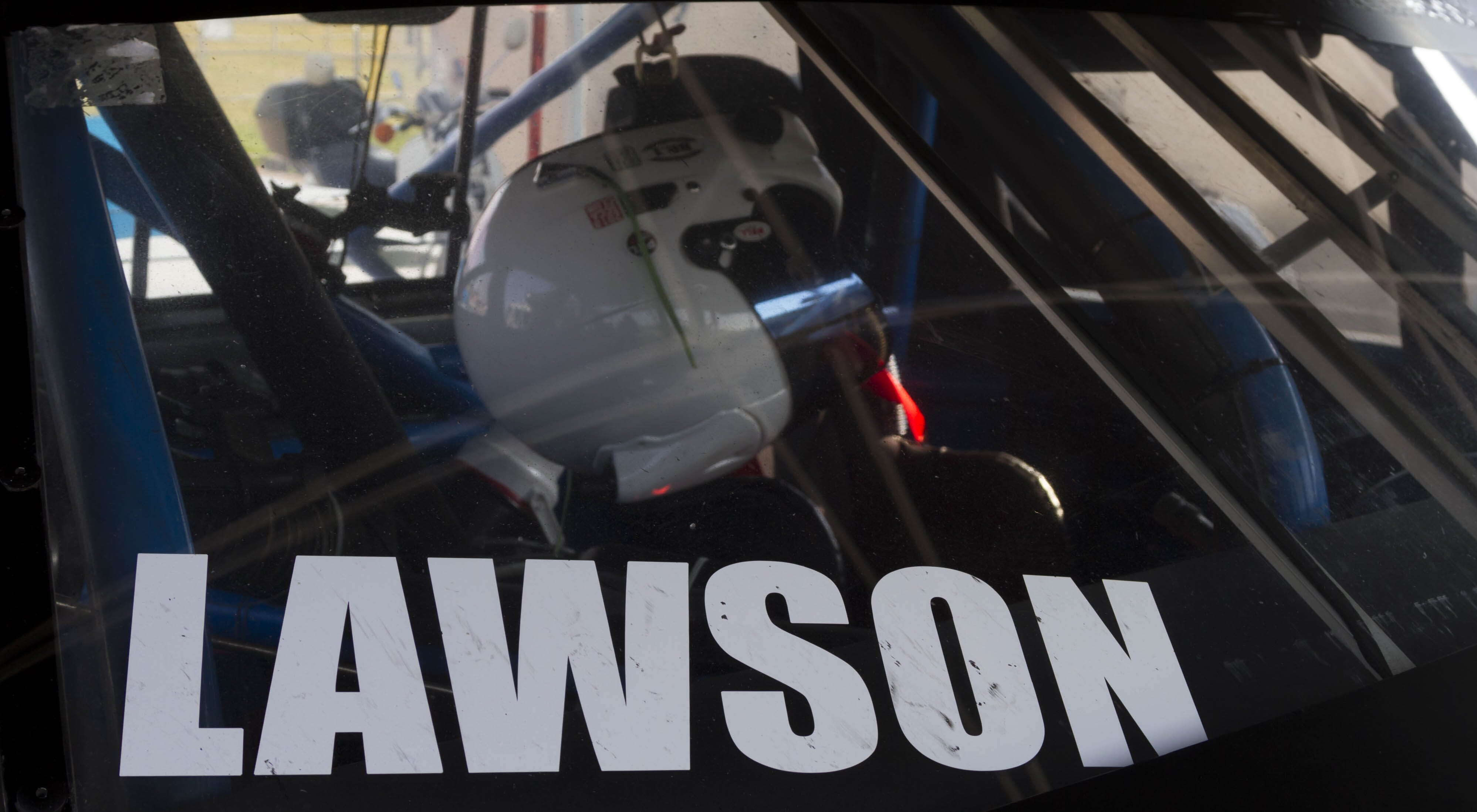 Chris' helmet rests in his custom F-150 before the race begins.